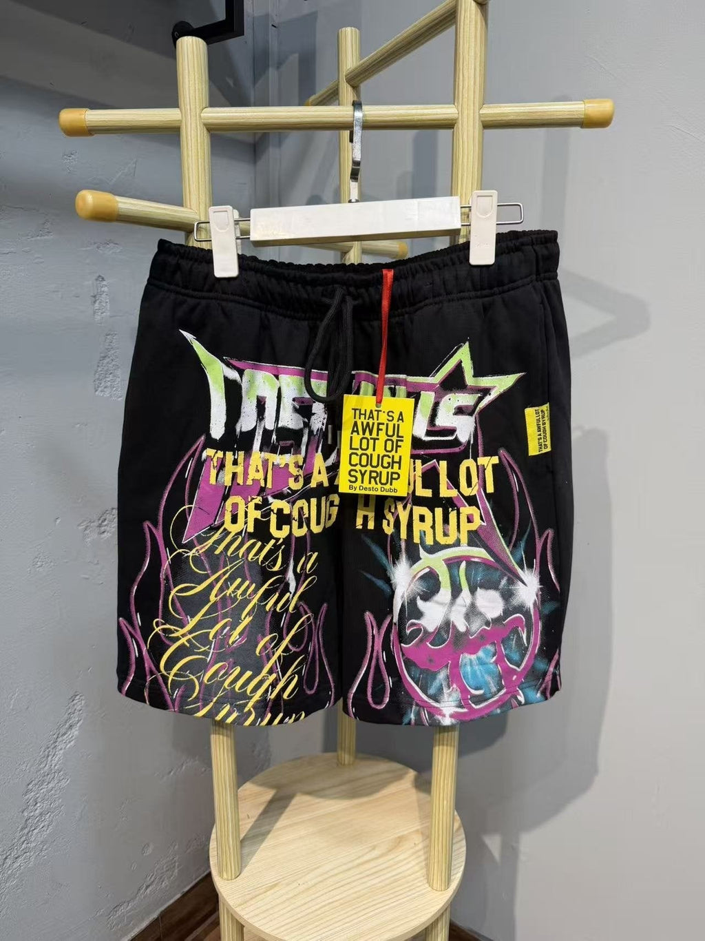 THAT'S A AWFUL LOT OF COUGH SYRUP Black Graphic Drawstring Shorts